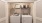 a small closet with a washer and dryer