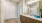 a bathroom with a large mirror