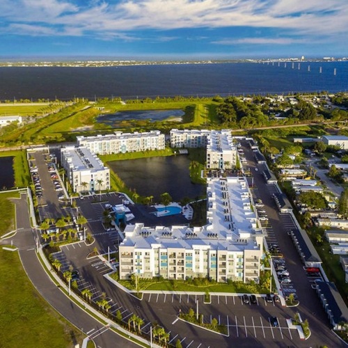 a large building next to a body of water