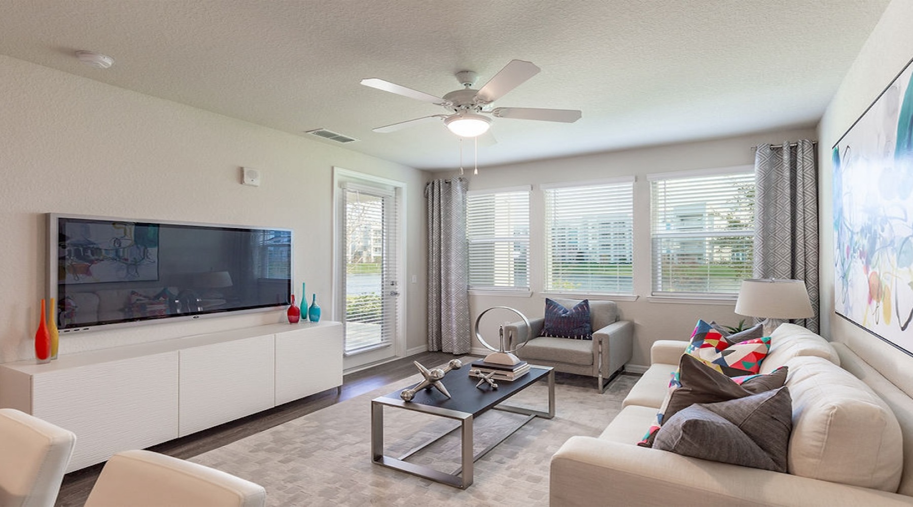 living room with easy to access spaces and ample lighting