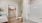 a bathroom with a tub toilet and sink