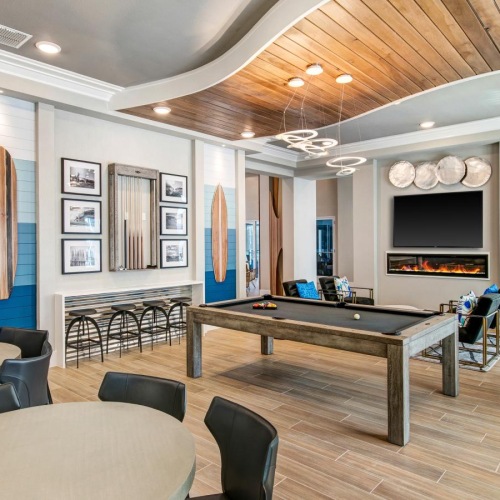 a large living room with a fireplace